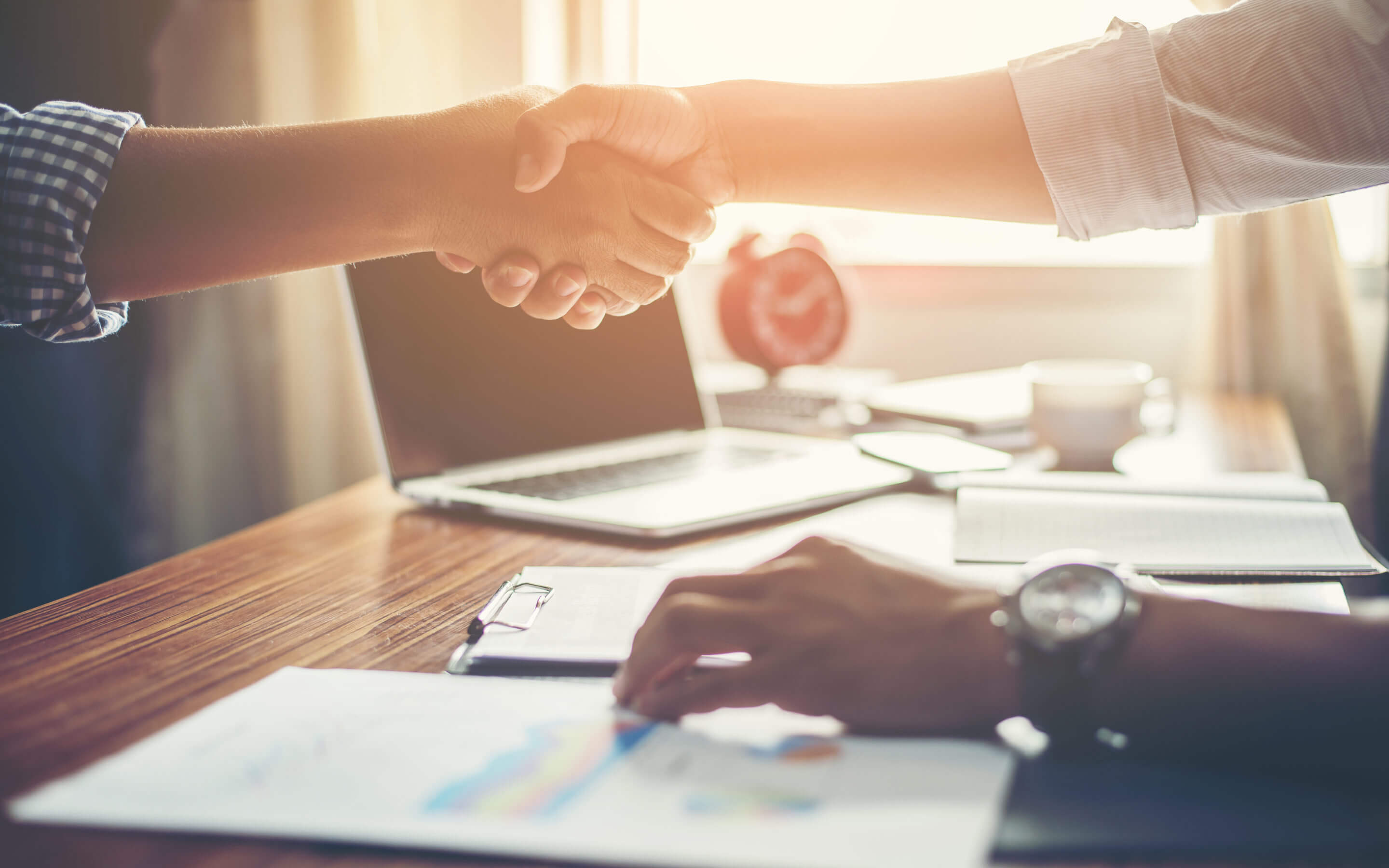 Business People Handshake Greeting Deal at work.